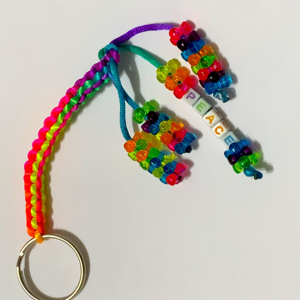 Hand crafted with groovy ❤️By D.B.     A multi color beaded KEYCHAIN.